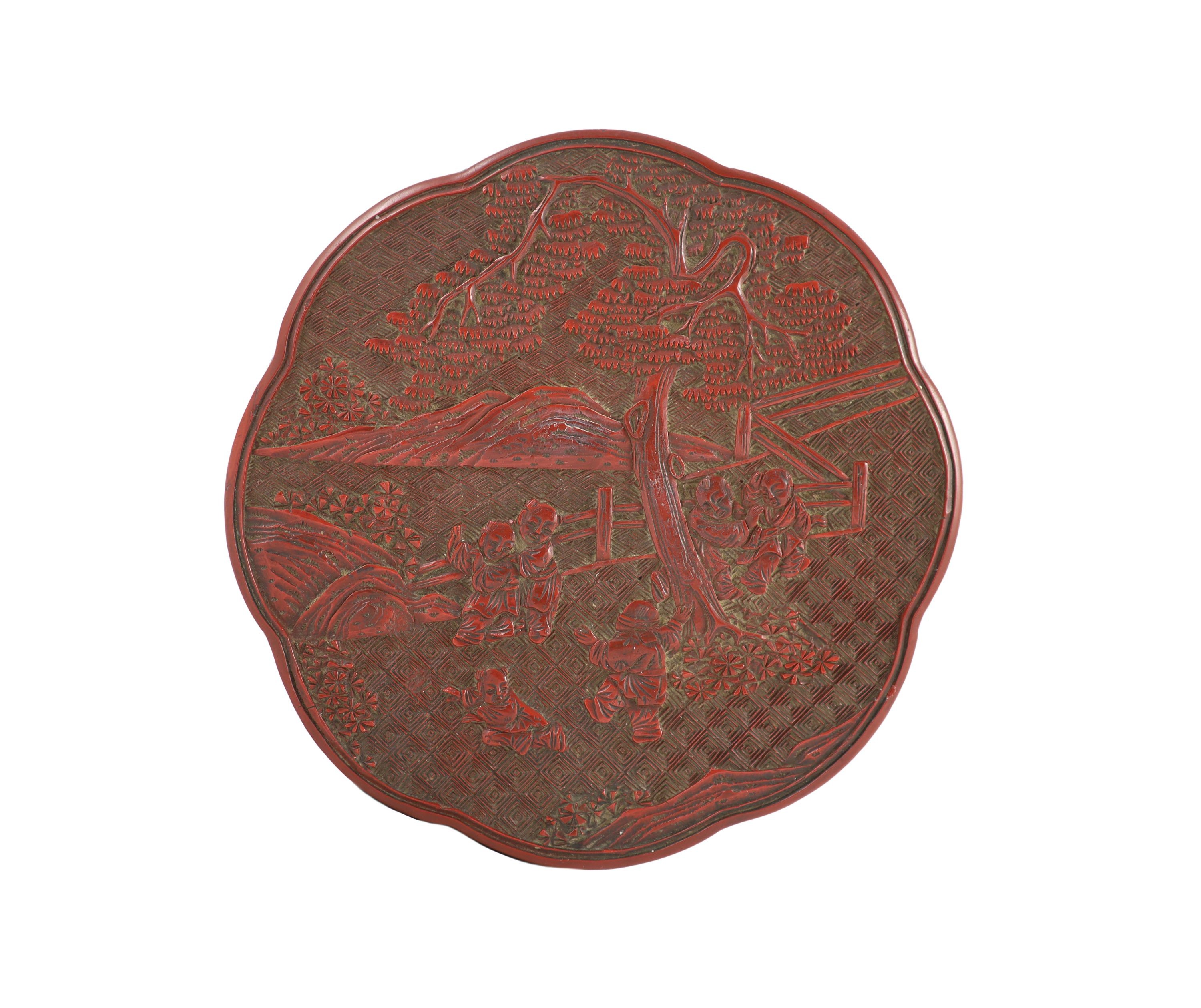 A Chinese cinnabar lacquer ‘boys’ box and cover, 19th century 13.5 cm diameter